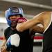 Northend boxer Casanovis Williams hits A-Square fighter LaSean Holmes in the seventh bout on Friday, July 19. Daniel Brenner I AnnArbor.com